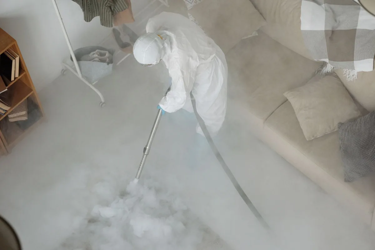Biohazard cleanup technician in protective equipment, Gatlinburg, TN